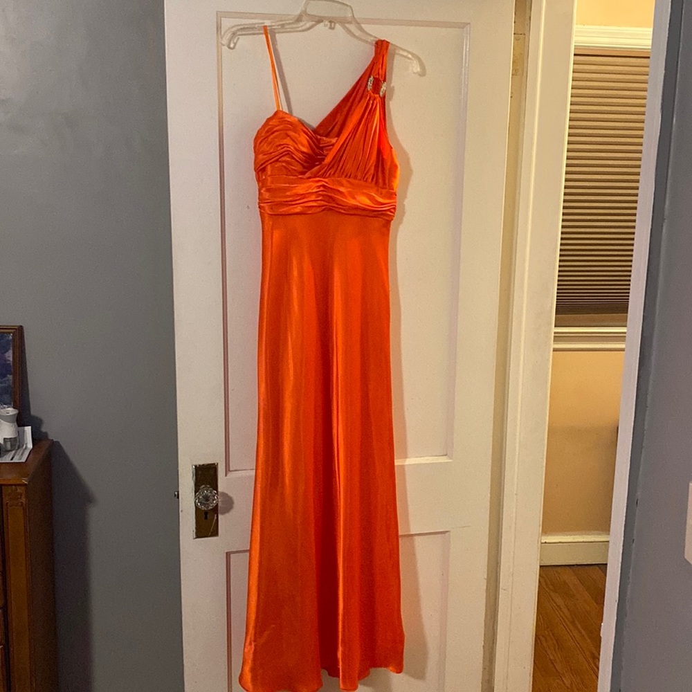Orange gown with rhinestone on top